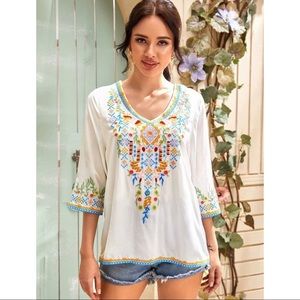 Tribal print V neck blouse